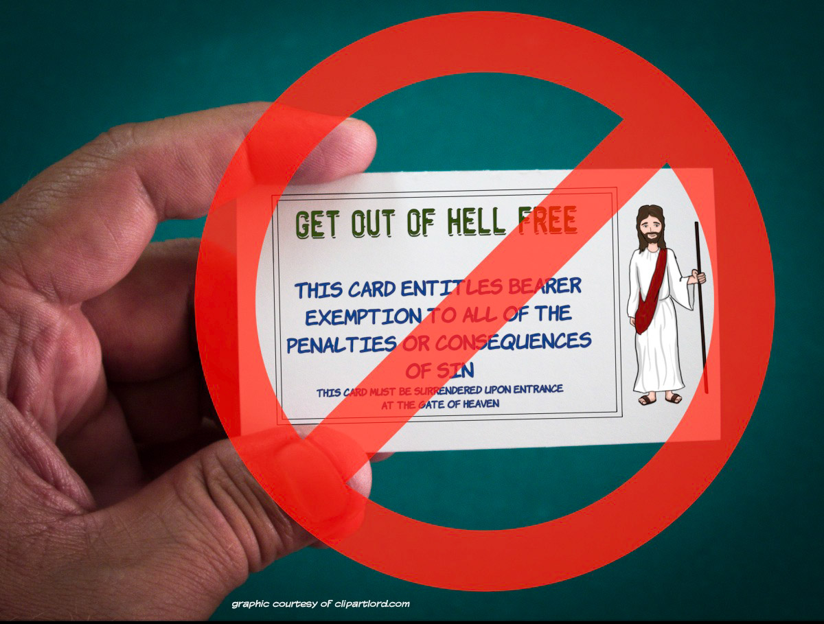 A photo of a hand holding a small card displaying the words '"GET OUT OF HELL FREE" This card entitles bearer exemption to all of the penalties or consequences of sin'