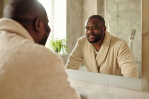 man-looking-mirror-pexels-diva-plavalaguna-5710305(https-::www.pexels.com:photo:a-man-looking-at-a-mirror-5710305:)