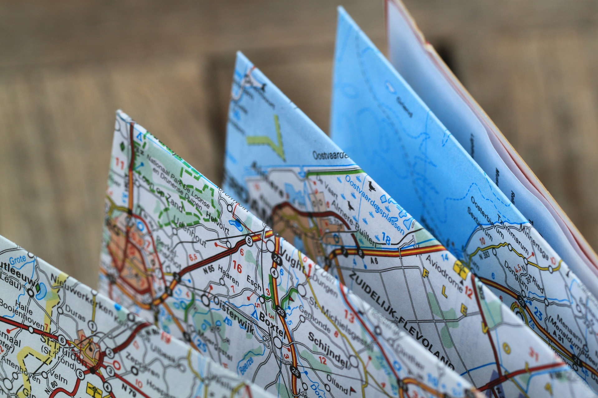 A road map folded symbolically in frustration of being hopelessly lost