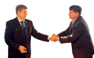 hand shaking businessmen