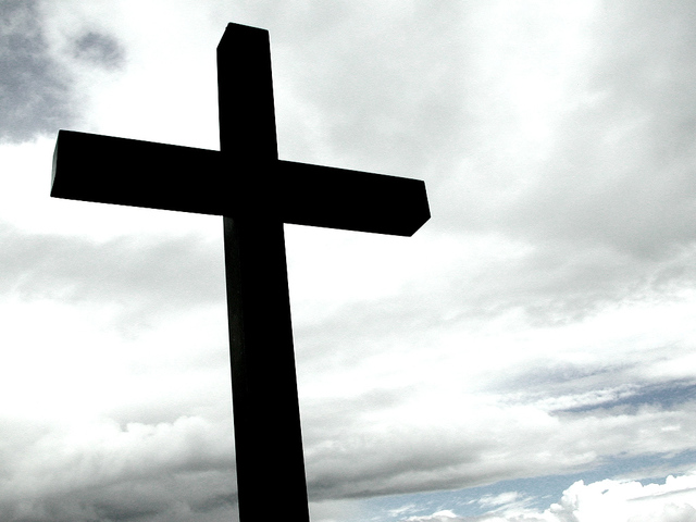 black cross on white sky