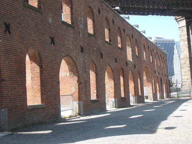 brick facade in an urban area symbolizing when you claim to know Jesus and don't really know Him your life is like a facade or empty shell