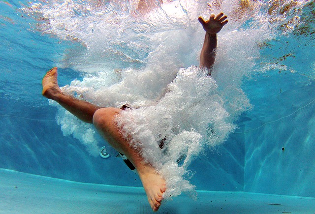 jumping in pool