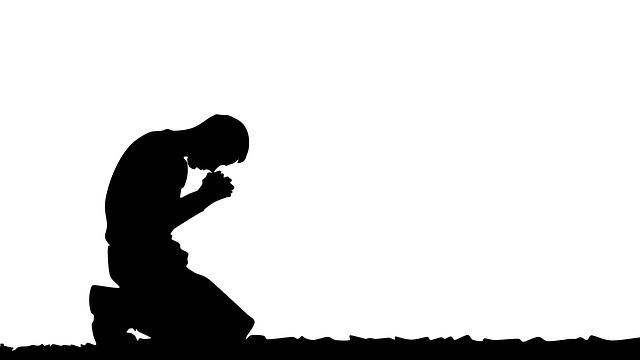 kneeling in prayer