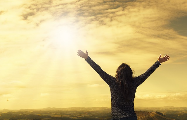 person in praise to the sky