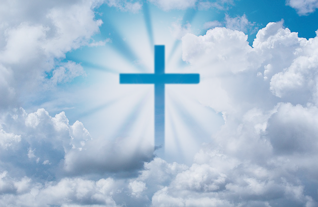 cross in clouds