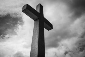 black and white cross symbolic of the key to freedom