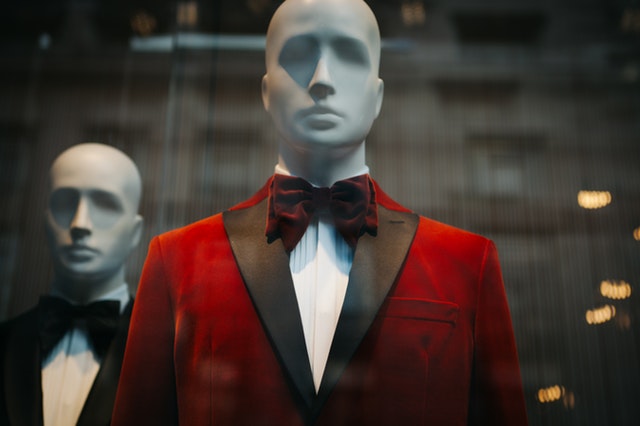 mannequin with red suit symbolizing how we can keep in a lie in disguise