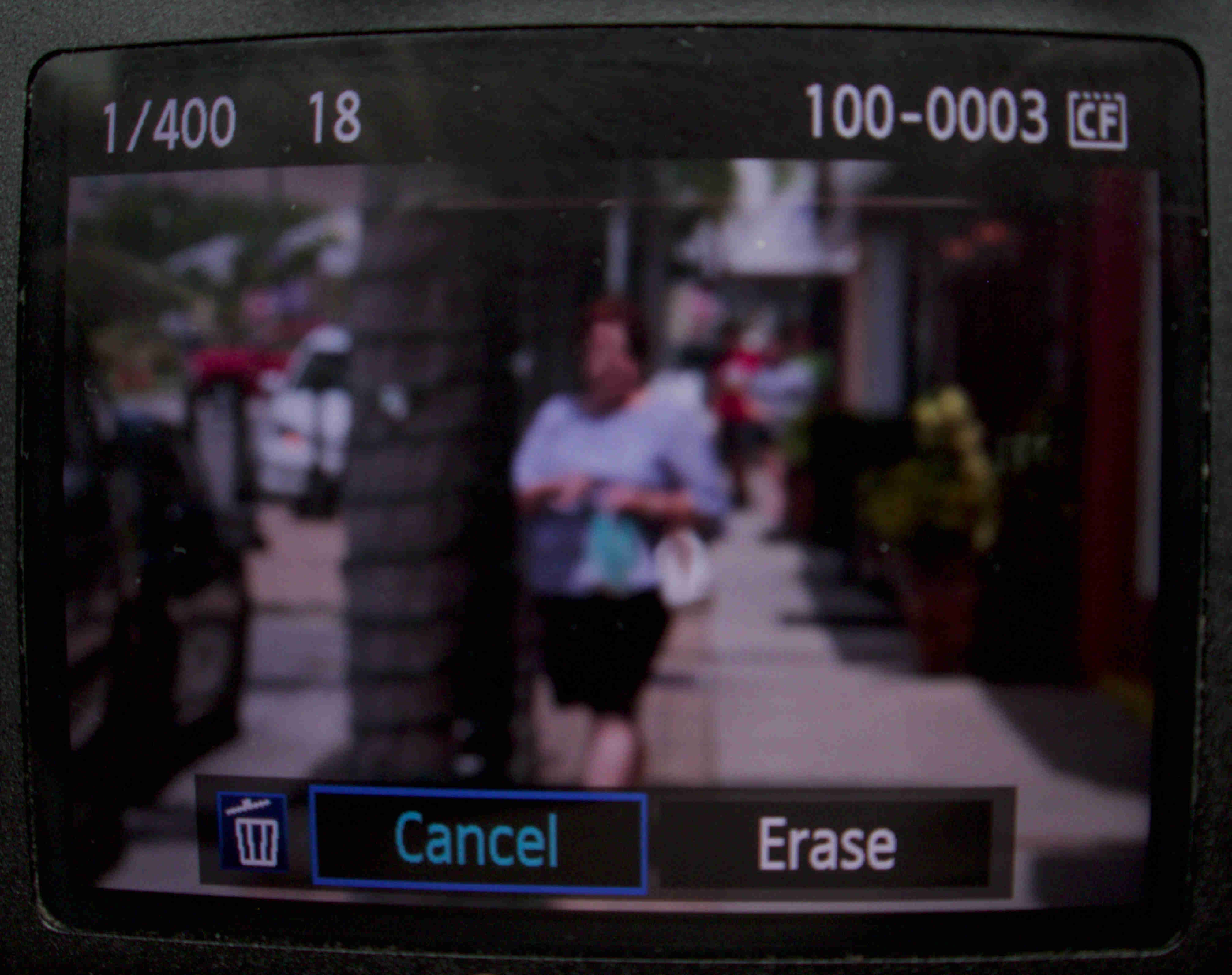 A preview from a digital camera of a blurred street scene