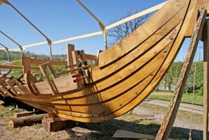 Photo of the building of a replica of a wooden Viking ship