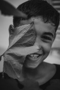 smile-6242237_1280(https-::pixabay.com:photos:smile-boy-kid-leaf-happy-child-6242237:)-FETHI-BOUHAOUCHINE