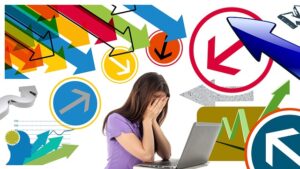 A photo and graphic of a woman in front of a laptop with hands over her face and arrows of all kinds pointing at her.