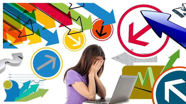 A photo and graphic of a woman in front of a laptop with hands over her face and arrows of all kinds pointing at her unable to face tomorrow.