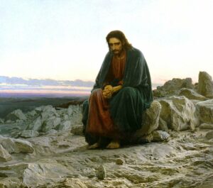 A painting of a man resembling Jesus sitting on rocks in prayer