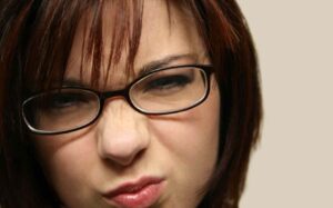Girl with sour face about to complain