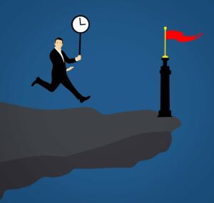 Graphical image of a man with a black suit and white shirt running towards the edge of a cliff (where there is a small flagpole with a red flag) smiling while holding a clock up on a stick.