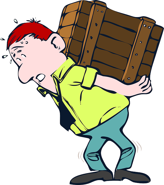 A graphical image of a Caucasian man with red hair, light green shirt, black tie, darker green pants struggling with a large wooden crate on his back