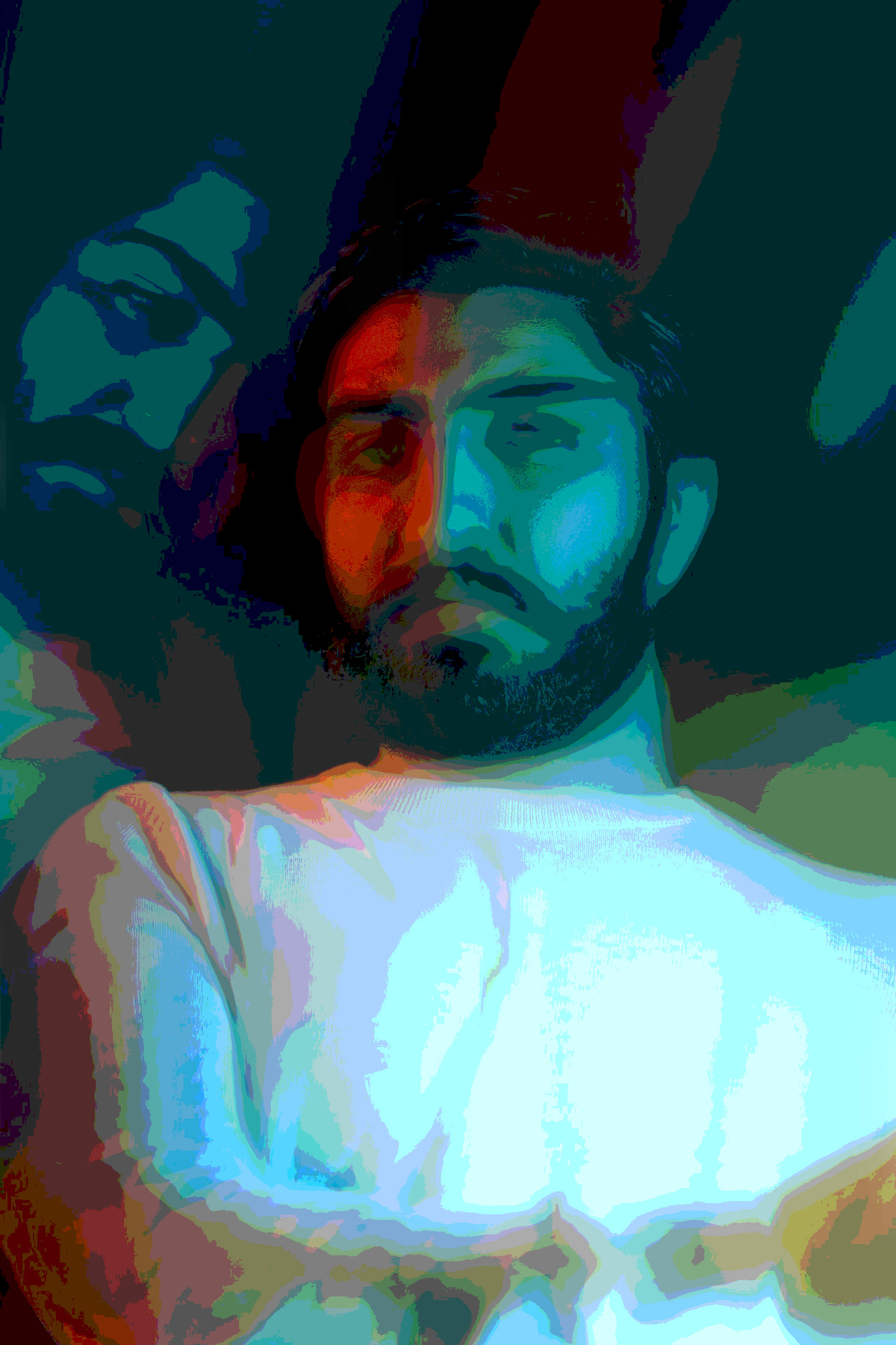 A posterized image of an Asian man with a straight face wearing a white mock turtleneck sweater with his arm fold across it and a partial side reflection of his face