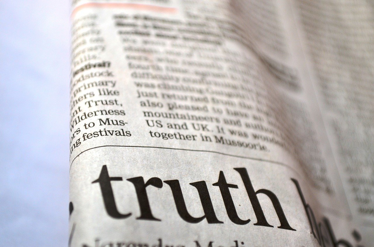 A section of newspaper with emphasis given to the word 'truth' and the rest of the paper out of focus