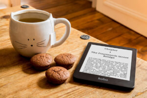 wotis bk 1 - ch 1 title-kobo-reader-coffee-mug-muffins-pexels-pe