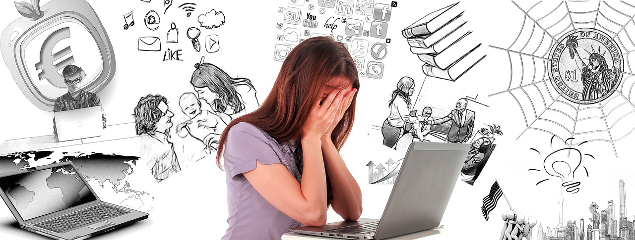 A composite photo and graphical illustration of a young Caucasian woman with long brown hair and a lavender t-shirt leaning against a grey laptop computer with her hands against her face and drawing in black and white of various topics of concern from education to family to finances behind her