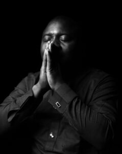 man-praying-ktmd-entertainment-bnHTJCFBKkY-unsplash(https:::unsplash.com:photos:bnHTJCFBKkY)