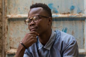 portrait-young-African-man-in-thought-g4501ff4f7_1280(https:::pixabay.com:photos:portrait-people-adult-africa-3157821:)-Artsy-Solomon