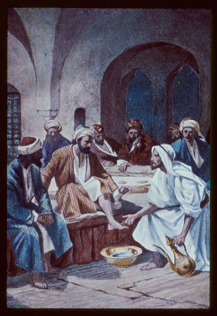 A painting of Christ about to wash Peter's feet among several others present