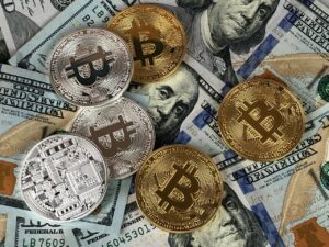 A collection of different forms of money laying flat