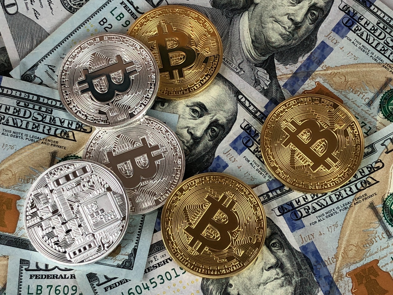 A collection of different forms of money laying flat
