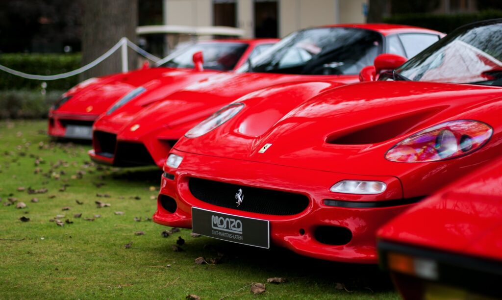 A set of red high end cars illustrating the need to be content with what we already have