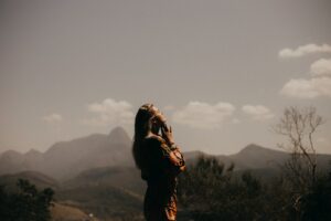 prayer-marcos-paulo-prado-LlrQF5JFRIs-unsplash(https-::unsplash.com:photos:woman-in-black-jacket-standing-on-green-grass-field-during-daytime-LlrQF5JFRIs)