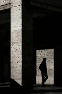 shadow-rene-bohmer-6SFfFpHmVjI-unsplash(https-::unsplash.com:photos:silhouette-of-man-standing-inside-structure-6SFfFpHmVjI)