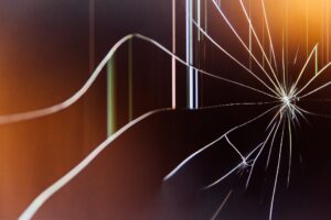 craked-glass-ivan-vranic-j9-2LIZ2_Rc-unsplash(https-::unsplash.com:photos:a-close-up-of-a-broken-glass-window-j9-2LIZ2_Rc)