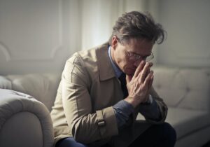 troubled-man-pexels-andrea-piacquadio-3772618(https-::www.pexels.com:photo:sad-mature-businessman-thinking-about-problems-in-living-room-3772618:)