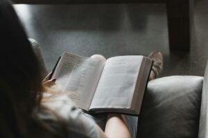 bible-reading-alexandra-fuller-Ju7LlnTZCrw-unsplash(https-::unsplash.com:photos:person-reading-book-on-black-leather-couch-Ju7LlnTZCrw)