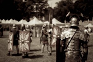 roman-armor-pexels-oană-andrei-12479511(https-::www.pexels.com:photo:men-dressed-in-armor-at-a-festival-12479511:)-sepia-tinted