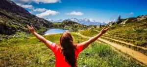 woman-praise-jametlene-reskp-1zrMk9WRzX4-unsplash(https-::unsplash.com:photos:woman-in-red-t-shirt-standing-on-green-grass-field-during-daytime-1zrMk9WRzX4)