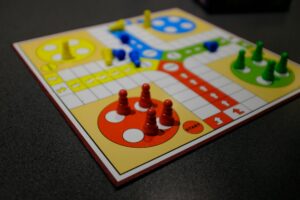 board-game-folu-eludire-O9Epo1PwX5A-unsplash(https-::unsplash.com:photos:white-red-yellow-and-blue-game-board-O9Epo1PwX5A)