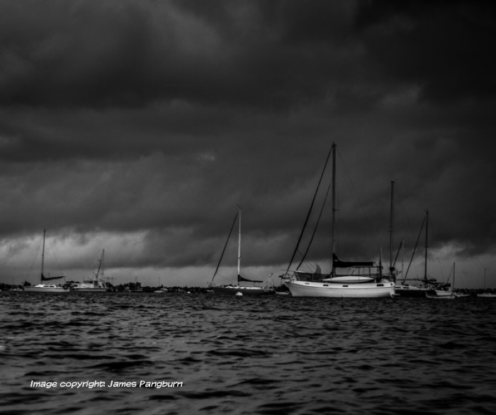 Boats on lake in storm