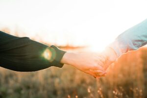 holding-hands-sunlight-joe-yates-wNOymf_yTUA-unsplash.jpg(https-::unsplash.com:photos:two-person-holding-each-others-hands-wNOymf_yTUA)